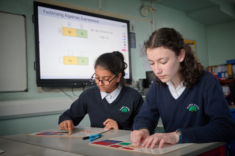 Two Female Students In Classroom Image 1