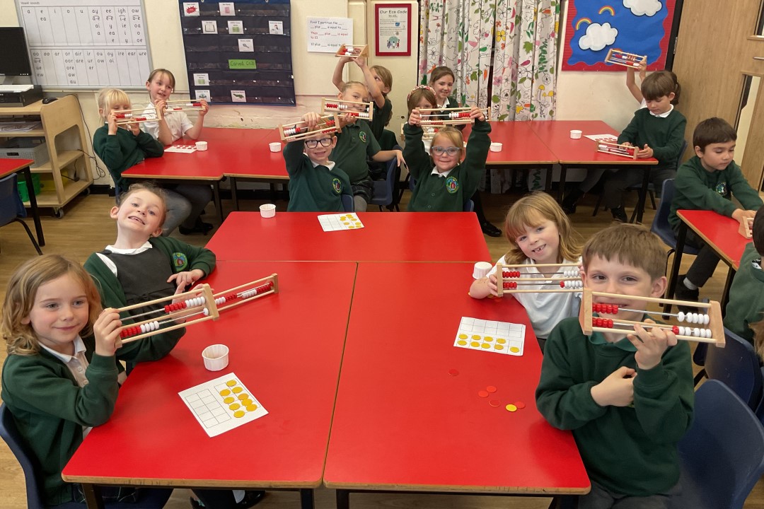 Children In Classroom With Rekenreks
